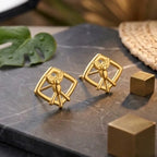 Marvel Silver 9K Gold angel geometric stud earrings for girls featuring an elegant angel motif inside a modern geometric frame.