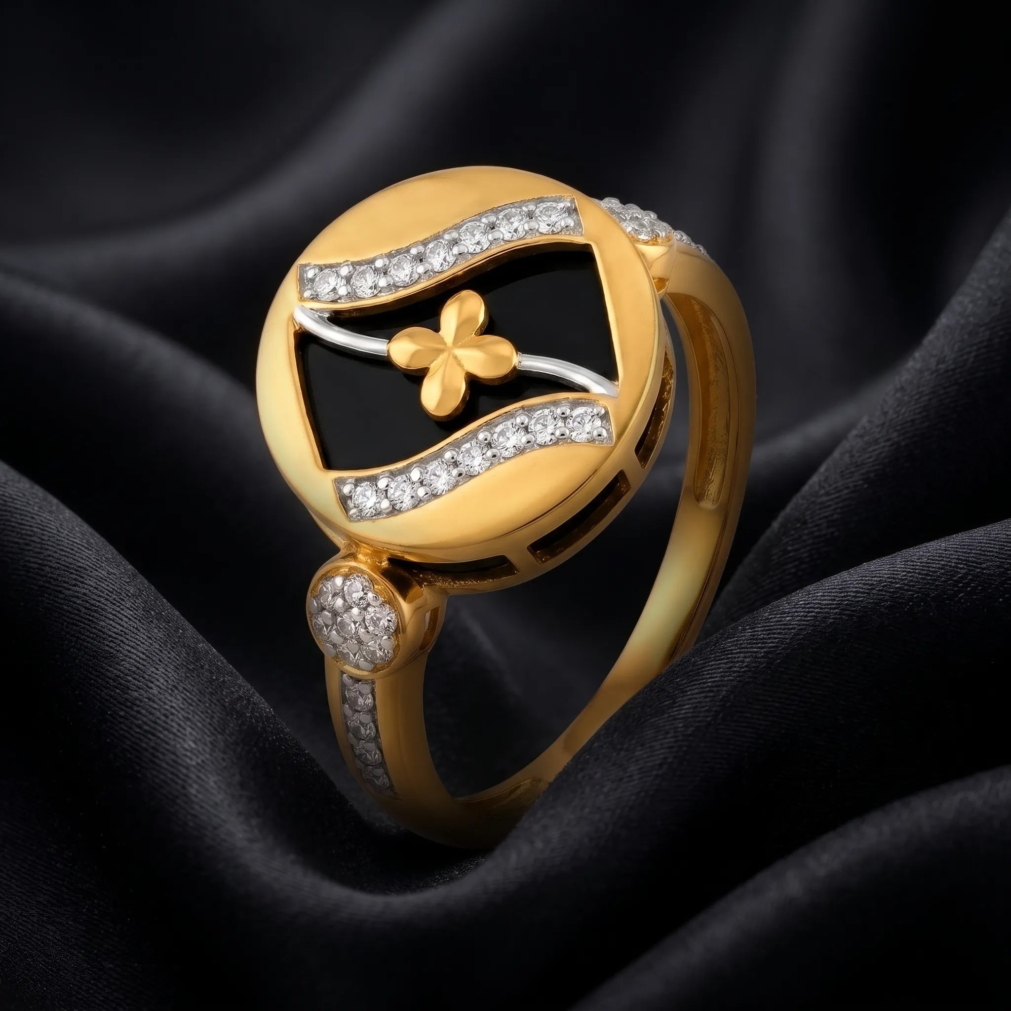 9K gold black floral crystal ring for girls with black enamel-style round top, white stone detailing and polished gold finish by Marvel Silver.