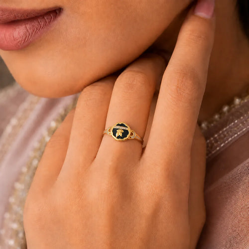9K gold black floral crystal ring for girls with white stone detailing and polished gold leaf design by Marvel Silver.