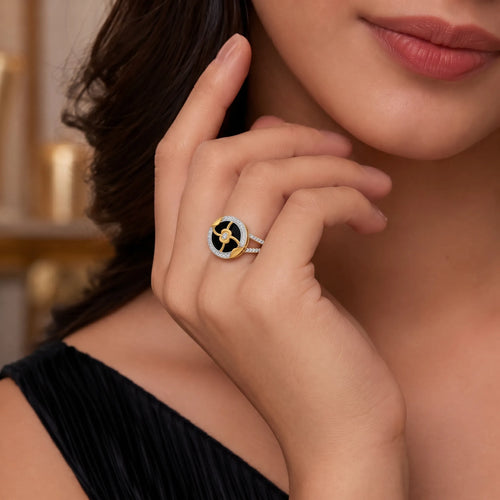 9K gold black floral crystal ring for girls with gold flower motif, white stone border and polished gold finish by Marvel Silver.