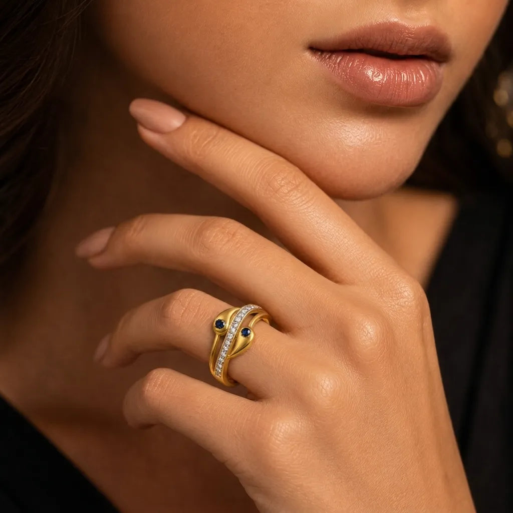 9K gold blue stone crystal ring for girls with dual blue stones, white crystal detailing and polished gold finish by Marvel Silver.