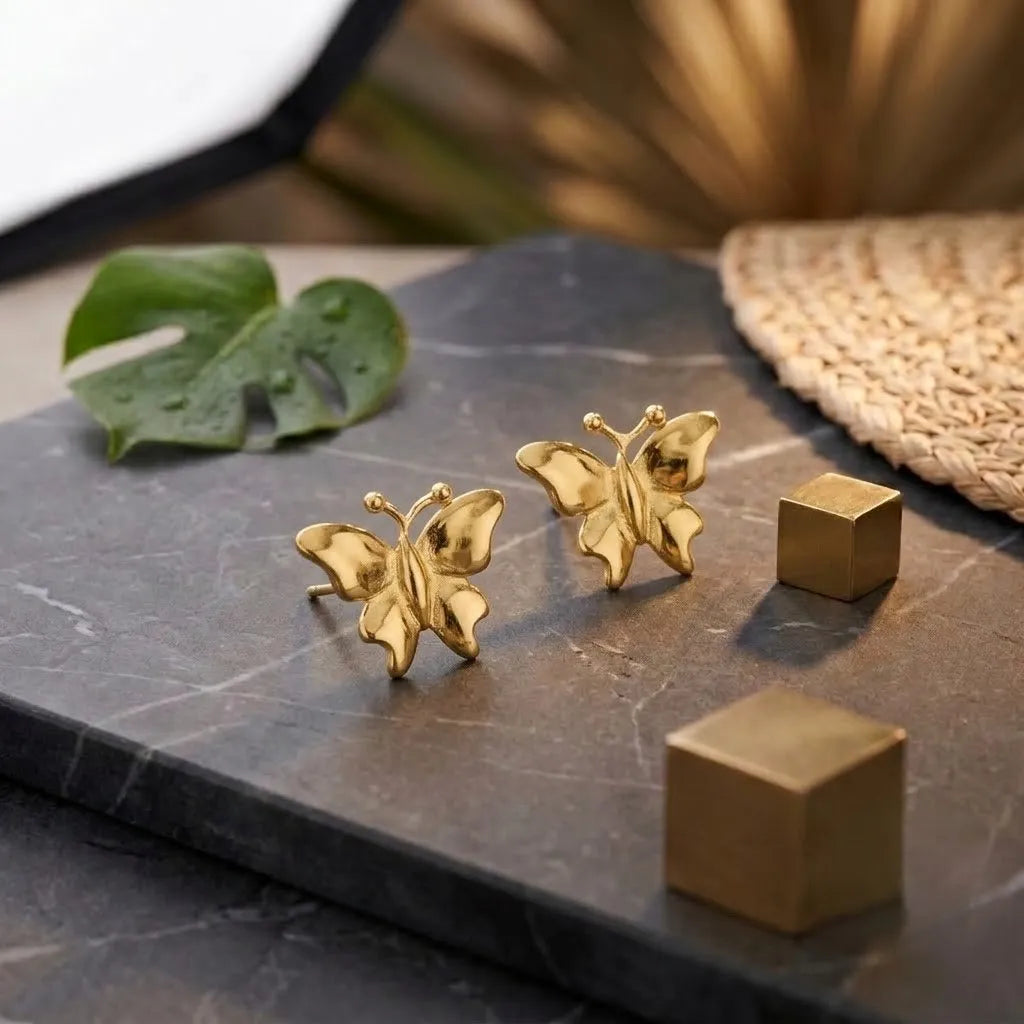 Marvel Silver 9K Gold butterfly stud earrings for women and girls featuring an elegant butterfly-inspired design.