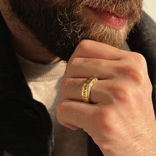 9K gold crystal chain design ring for men with a wide polished gold band and white stone detailing by Marvel Silver.