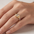 9K gold crystal leaf ring for girls with openwork leaf design, double white stone rows and polished gold band by Marvel Silver.