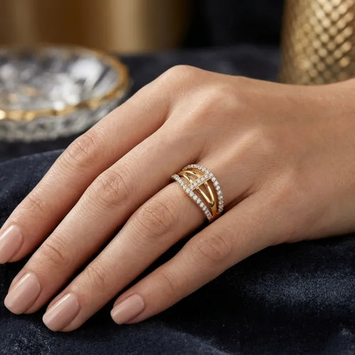 9K gold crystal oval crossover ring for girls with openwork gold bands and white stone-studded borders by Marvel Silver.
