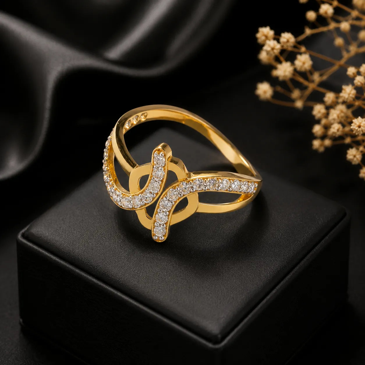 9K gold crystal swirl ring for girls with openwork crossover design and white stone detailing by Marvel Silver.