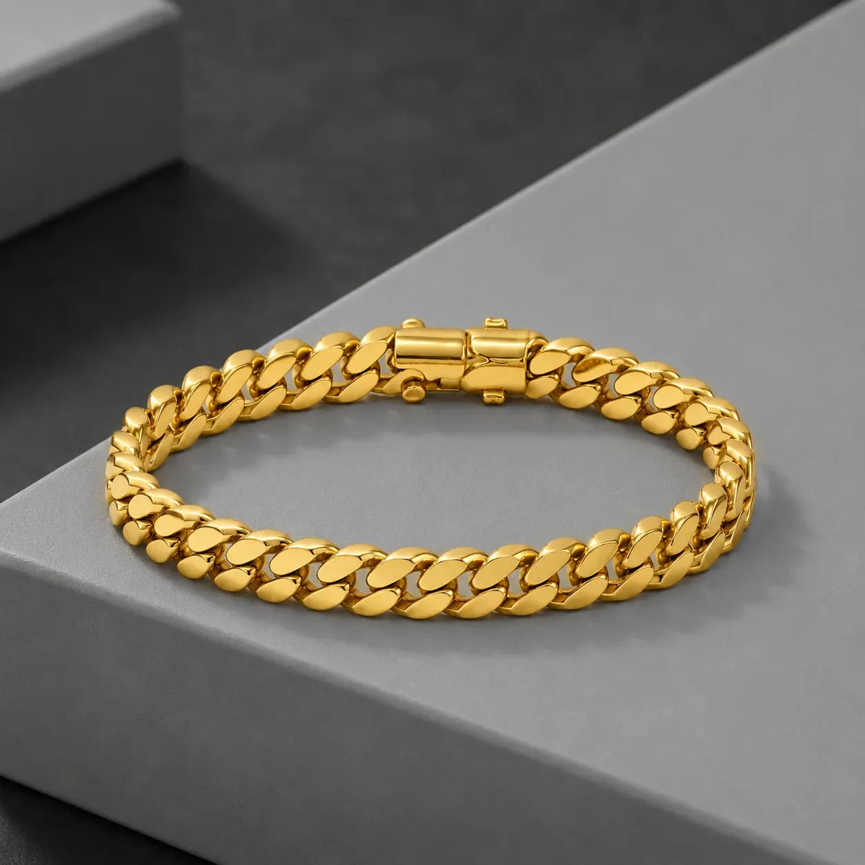 9K gold Cuban link bracelet for men with polished gold links and secure clasp by Marvel Silver.