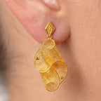 Marvel Silver 9K Gold designer mesh dangle earrings for girls featuring an intricate openwork pattern with a polished gold finish and elegant statement design.