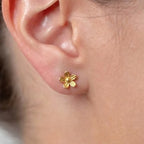 Marvel Silver 9K Gold five-petal flower stud earrings for girls featuring textured petals and a classic floral-inspired design.