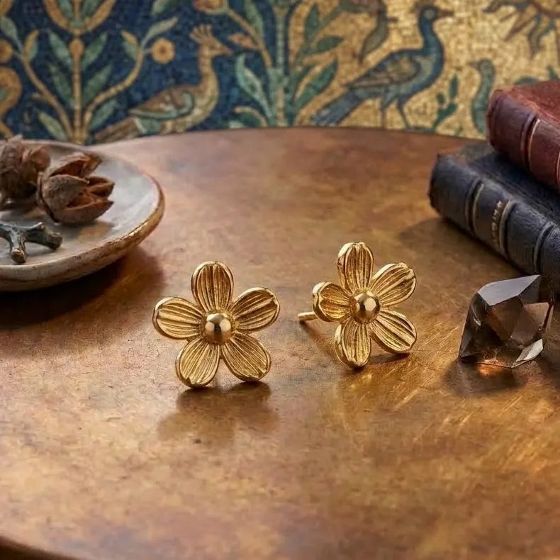 Marvel Silver 9K Gold five-petal flower stud earrings for girls featuring textured petals and a classic floral-inspired design.