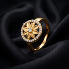 9K gold floral crystal ring for girls with round flower motif and white stone-studded border by Marvel Silver.