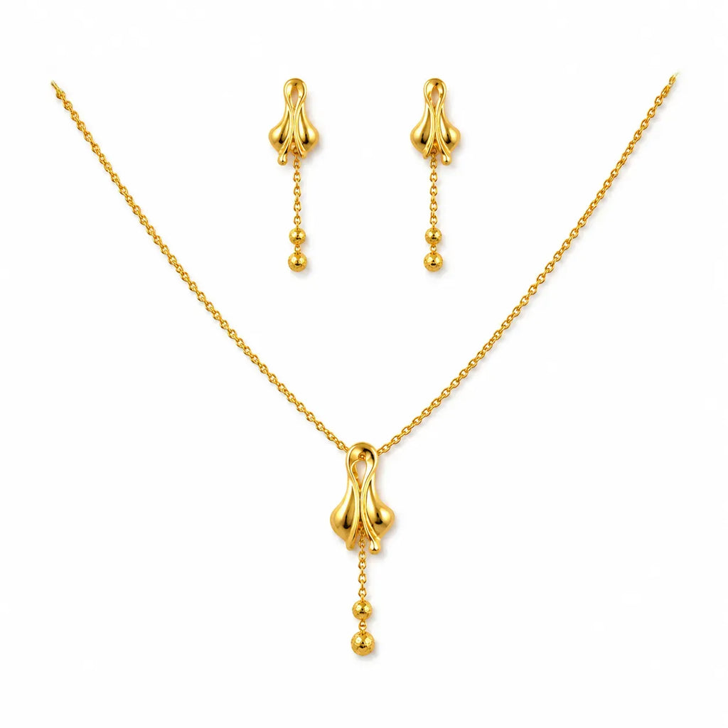 9K gold floral drop necklace set for women with polished pendant, hanging bead details and matching earrings by Marvel Silver.