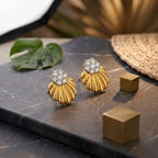 Marvel Silver 9K Gold floral stud earrings with sparkling CZ stone cluster for girls in an elegant flower-inspired design.