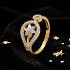 9K gold floral teardrop crystal ring for girls with white stone border and flower centre motif by Marvel Silver.