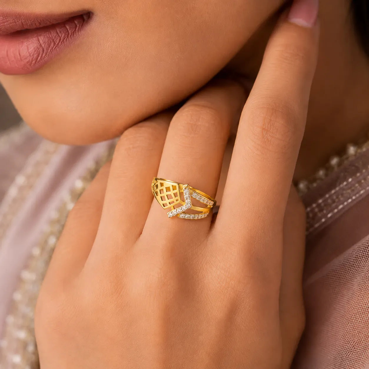 9K gold geometric crystal ring for girls with open lattice design and white stone-studded crossover detail by Marvel Silver.