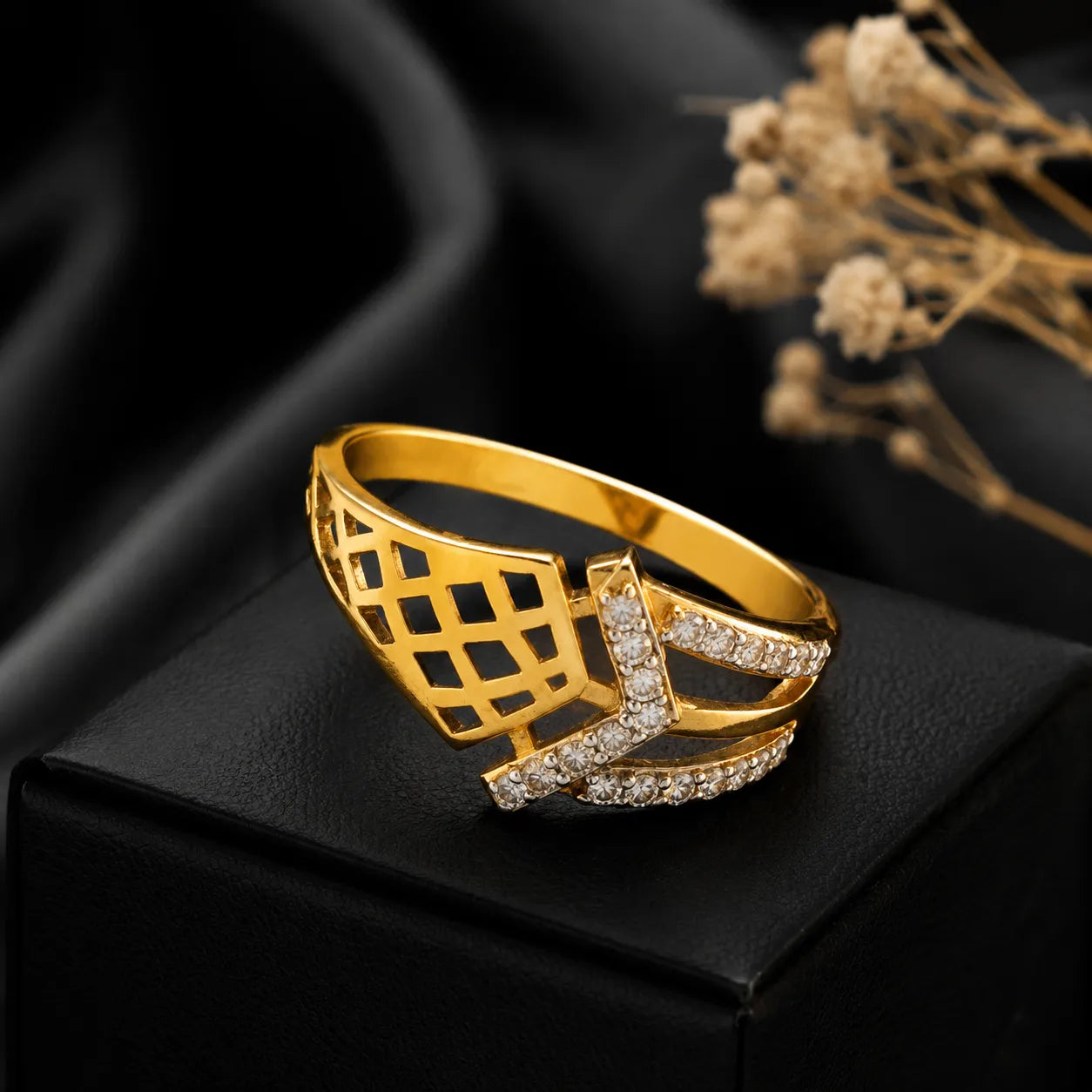 9K gold geometric crystal ring for girls with open lattice design and white stone-studded crossover detail by Marvel Silver.