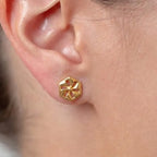 Marvel Silver 9K Gold geometric floral stud earrings for girls featuring a modern hexagonal frame with an elegant floral-inspired cutout design.