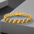 9K gold Greek pattern Cuban link bracelet for men with polished gold links, black engraved detailing and secure clasp by Marvel Silver.