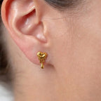 Marvel Silver 9K Gold heart drop stud earrings for girls featuring a modern heart-inspired design with an artistic dripping pattern.