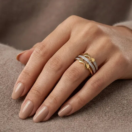 9K gold infinity crystal ring for girls with polished gold finish and white stone detailing by Marvel Silver.