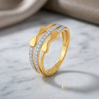9K gold infinity crystal ring for girls with polished gold finish and white stone detailing by Marvel Silver.