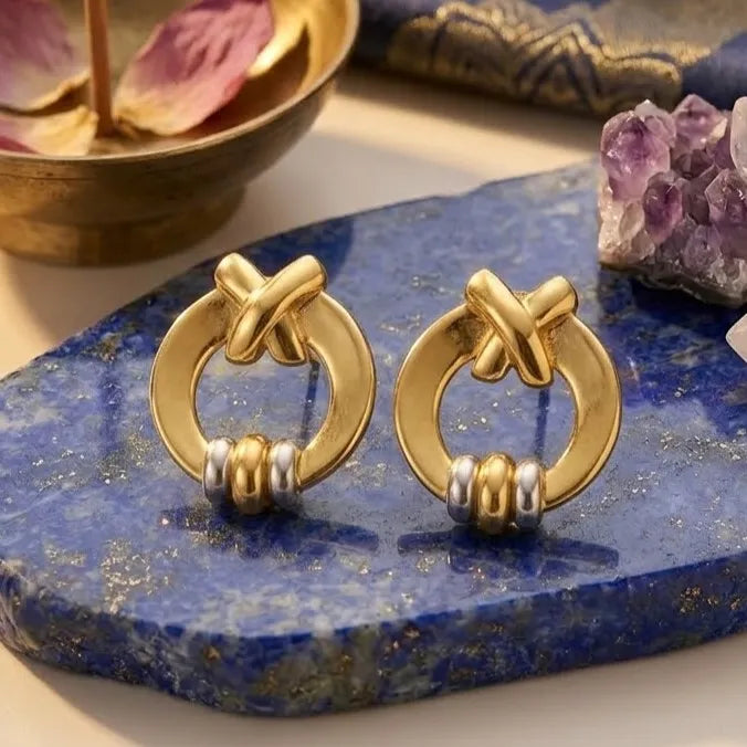 Marvel Silver 9K Gold modern circle knot stud earrings for girls featuring a polished gold circular frame with dual-tone gold and silver accents.