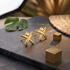 Marvel Silver 9K Gold modern cross bar stud earrings for girls featuring an intersecting geometric design with an elegant gold finish.