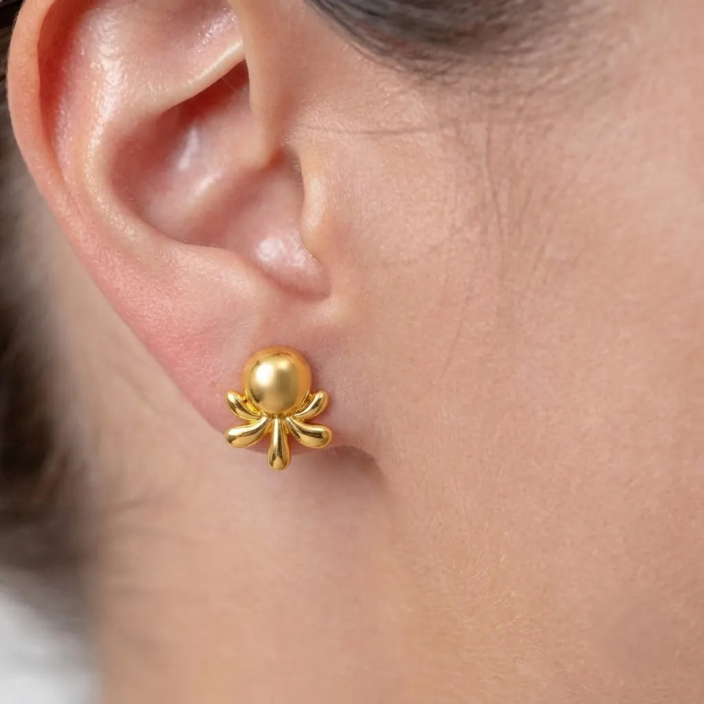 Marvel Silver 9K Gold modern designer stud earrings for girls featuring a smooth round top with elegant abstract curved accents.