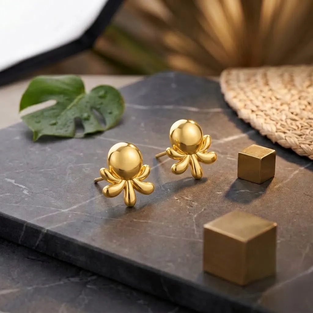 Marvel Silver 9K Gold modern designer stud earrings for girls featuring a smooth round top with elegant abstract curved accents.