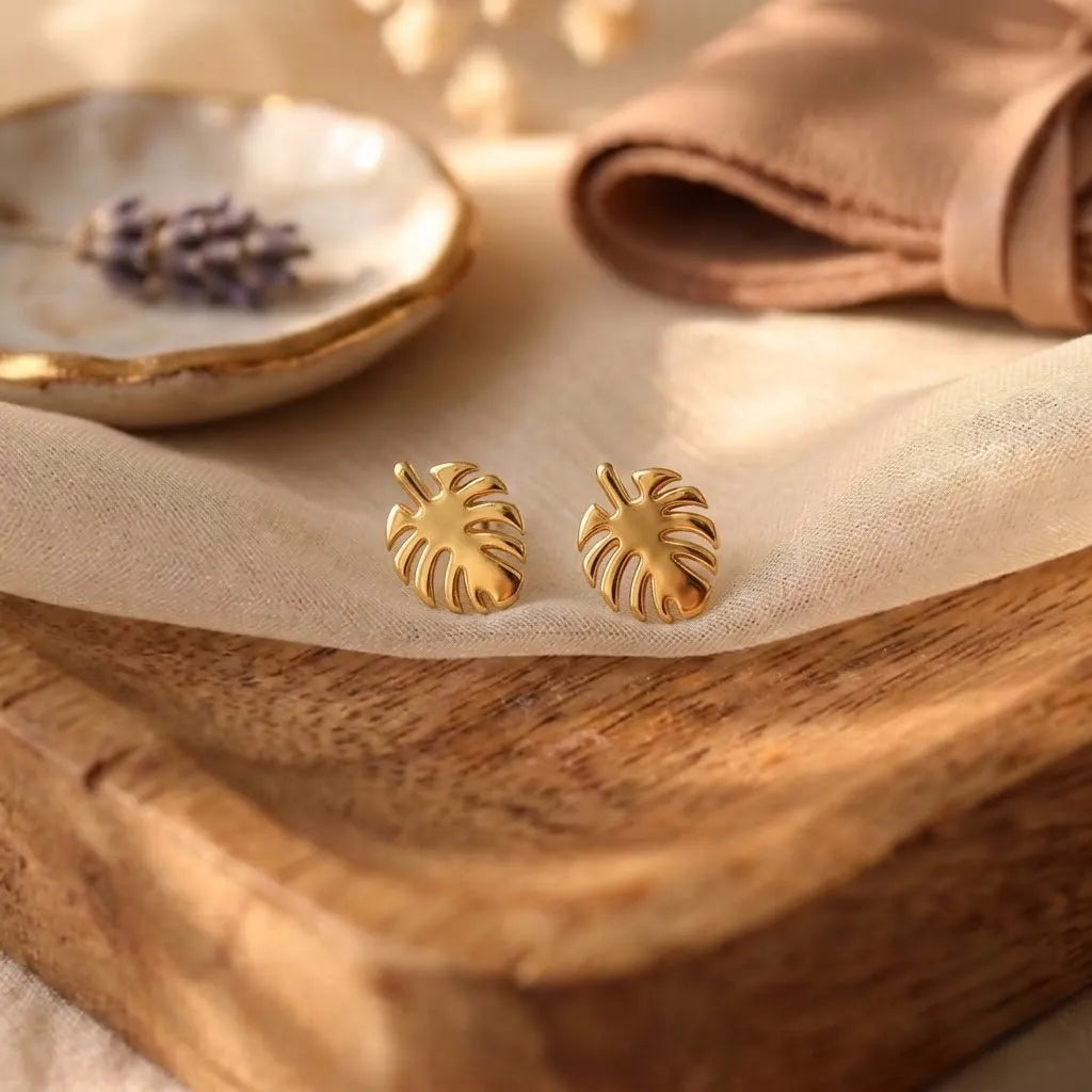 Marvel Silver 9K gold Monstera leaf stud earrings with a polished finish for women and girls, minimalist fine gold jewelry for everyday wear.