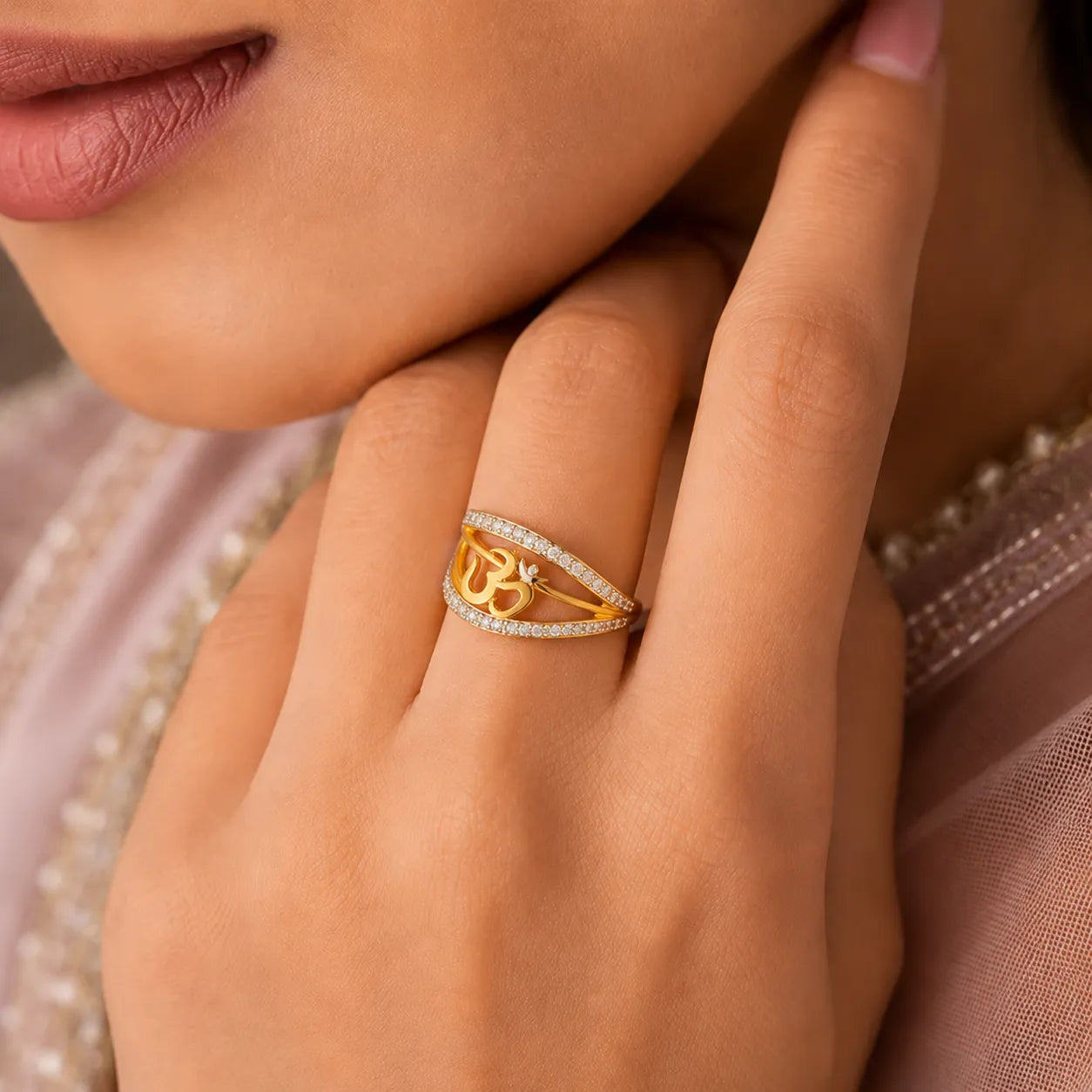 9K gold Om crystal ring for girls with white stone detailing and polished gold finish by Marvel Silver.