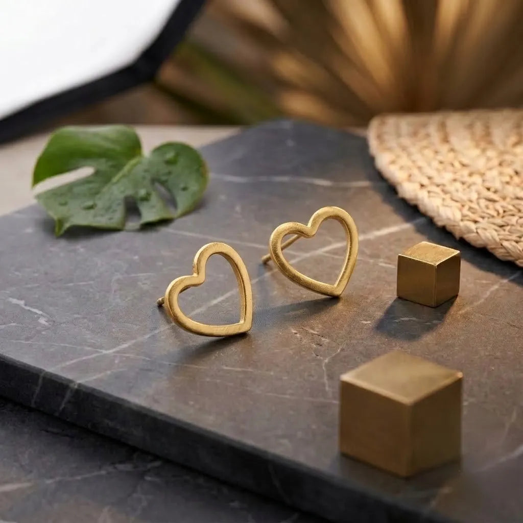 Marvel Silver 9K Gold open heart stud earrings for women and girls featuring a minimalist heart-shaped design.