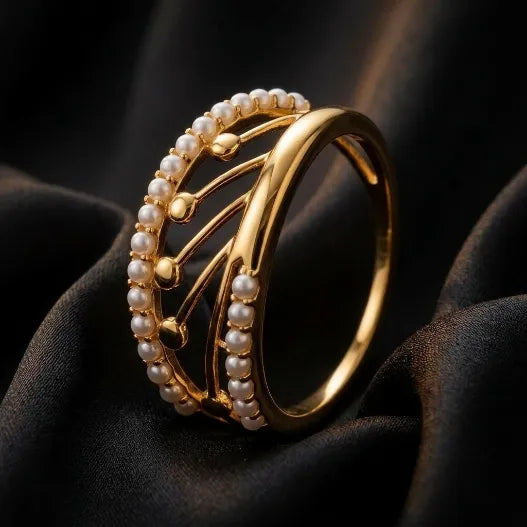 9K gold pearl designer ring for girls with openwork curved design and white pearl detailing by Marvel Silver.