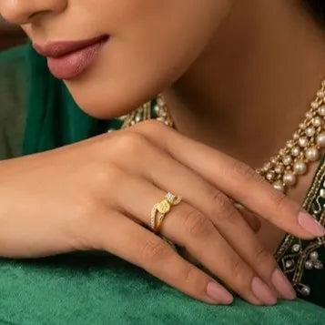 9K gold sunflower crystal ring for girls with dual-band design, square white stone and floral gold motif by Marvel Silver.