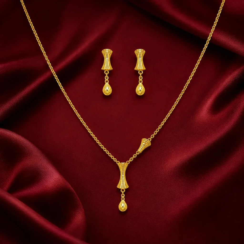 9K gold textured drop necklace set for women with an hourglass-style pendant and matching hanging earrings by Marvel Silver.
