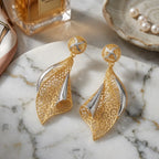 9K gold two tone floral leaf dangler earrings for girls with openwork design and silver-tone accents by Marvel Silver.