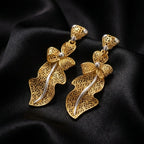 9K gold two tone floral leaf dangler earrings for girls with long openwork lattice design and silver-tone accents by Marvel Silver.