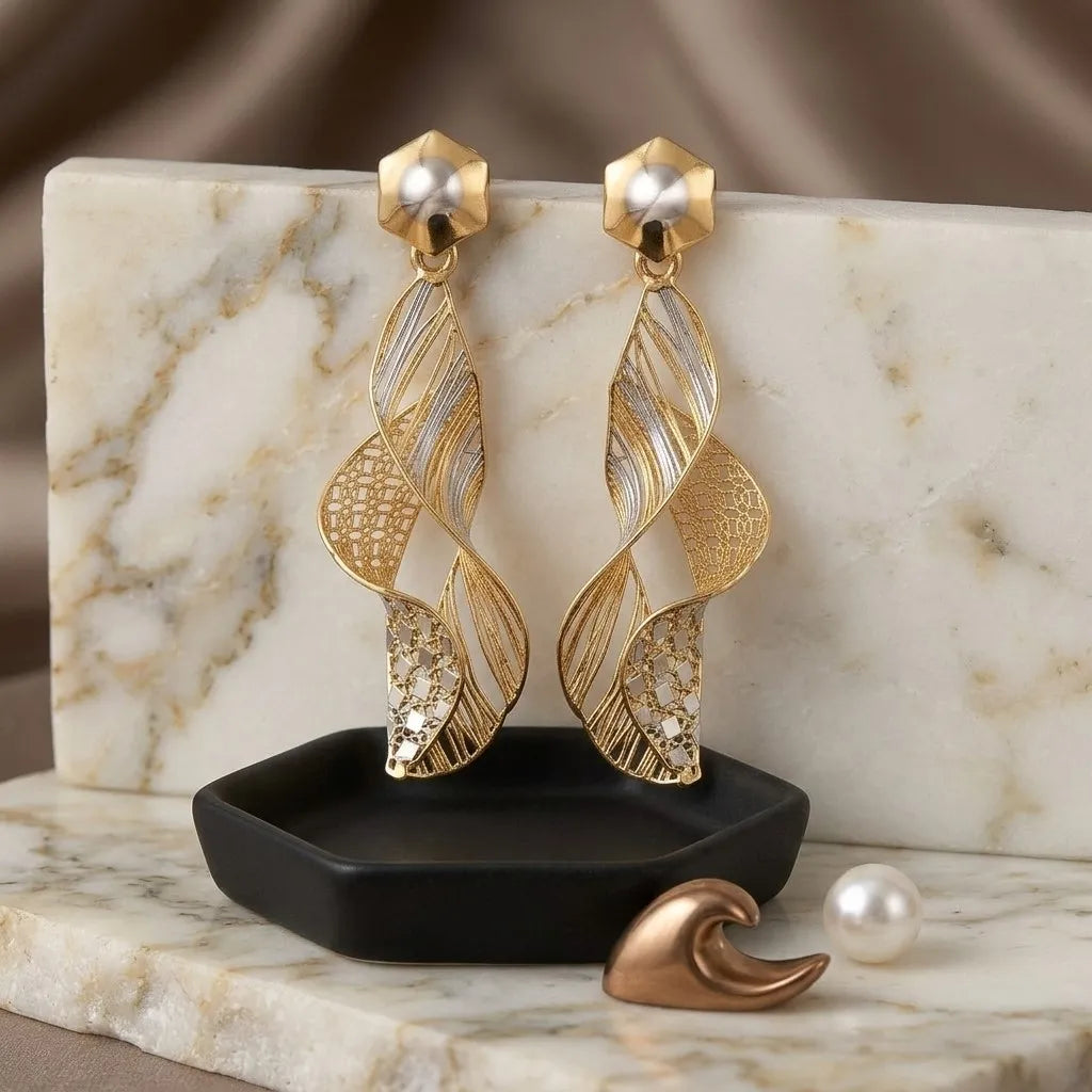 9K gold two tone spiral dangler earrings for girls with long openwork design and silver-tone highlights by Marvel Silver.