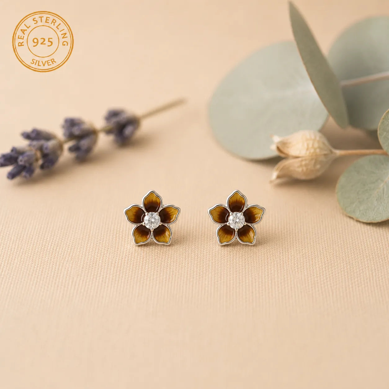 Marvel Silver amber floral crystal stud earrings featuring glossy enamel flower petals with a sparkling crystal centre for women and girls.