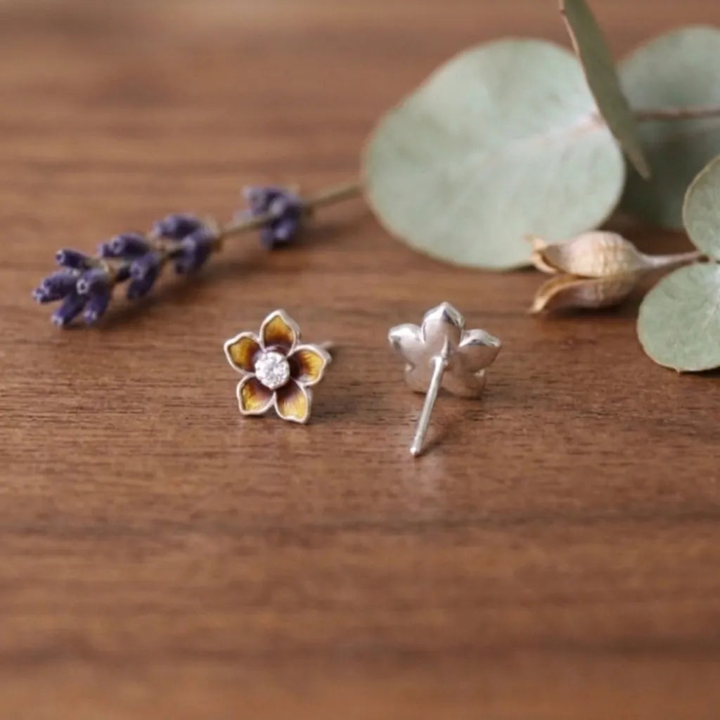 Marvel Silver amber floral crystal stud earrings featuring glossy enamel flower petals with a sparkling crystal centre for women and girls.