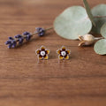 Marvel Silver amber floral crystal stud earrings featuring glossy enamel flower petals with a sparkling crystal centre for women and girls.
