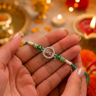 BRO Silver Rakhi with Green Crystal Beads