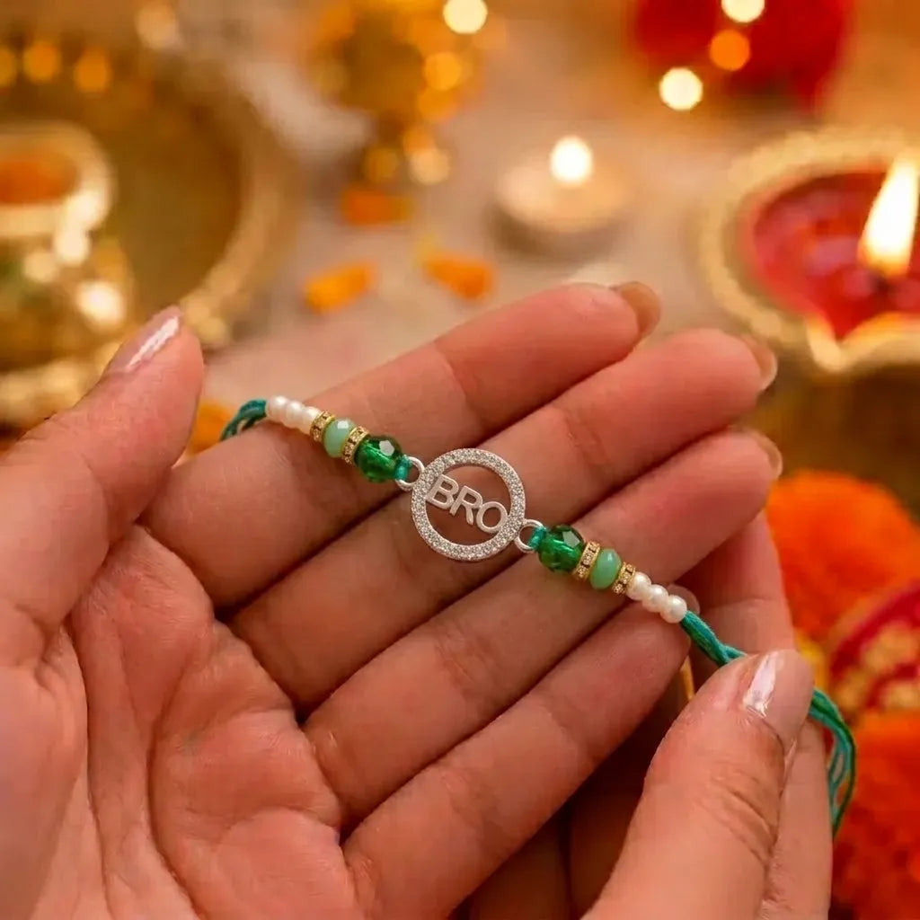 Marvel Silver BRO Silver Rakhi with Green Crystal Beads, White Pearl Beads and Sparkling BRO Charm for Raksha Bandhan