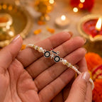 Marvel Silver Bicycle Silver Rakhi with White Crystal Beads, White Pearl Beads and Designer Bicycle Charm for Raksha Bandhan