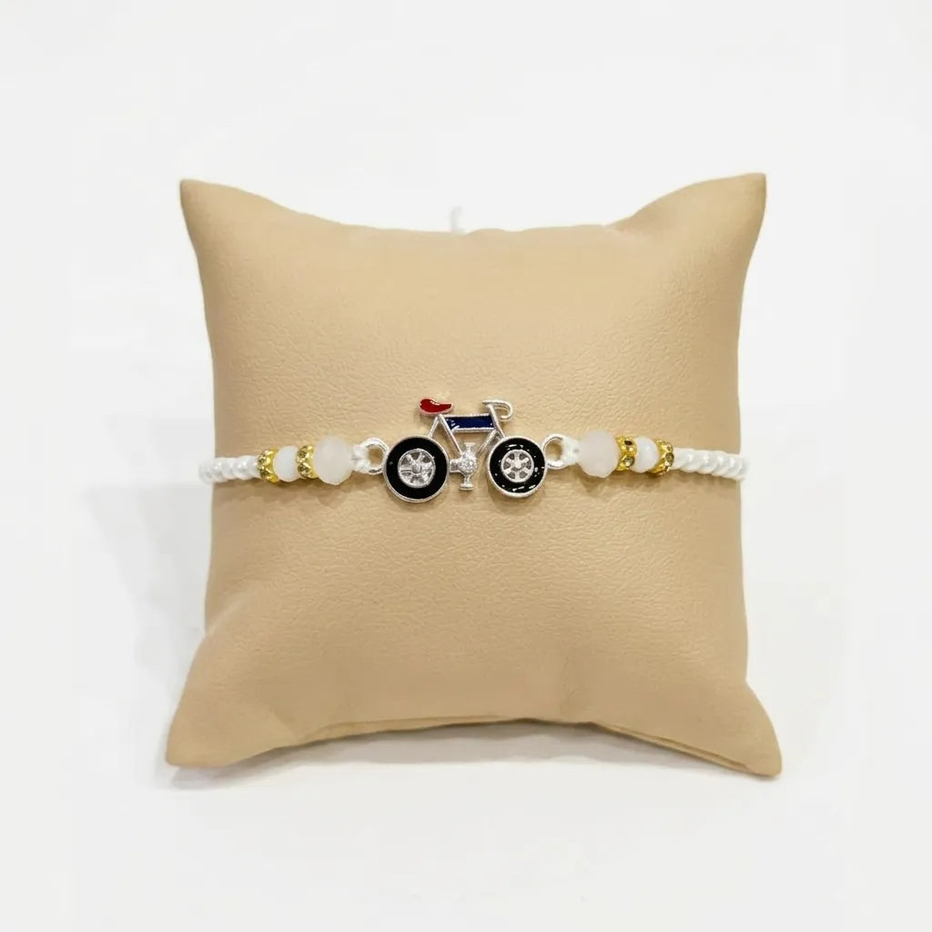 Marvel Silver Bicycle Silver Rakhi with White Crystal Beads, White Pearl Beads and Designer Bicycle Charm for Raksha Bandhan