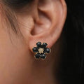 Marvel Silver Black Enamel Flower Stud Earrings with Crystal Center and Gold-Tone Finish for Women