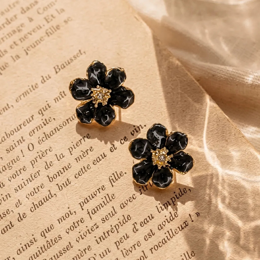 Marvel Silver Black Enamel Flower Stud Earrings with Crystal Center and Gold-Tone Finish for Women