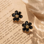 Marvel Silver Black Enamel Flower Stud Earrings with Crystal Center and Gold-Tone Finish for Women
