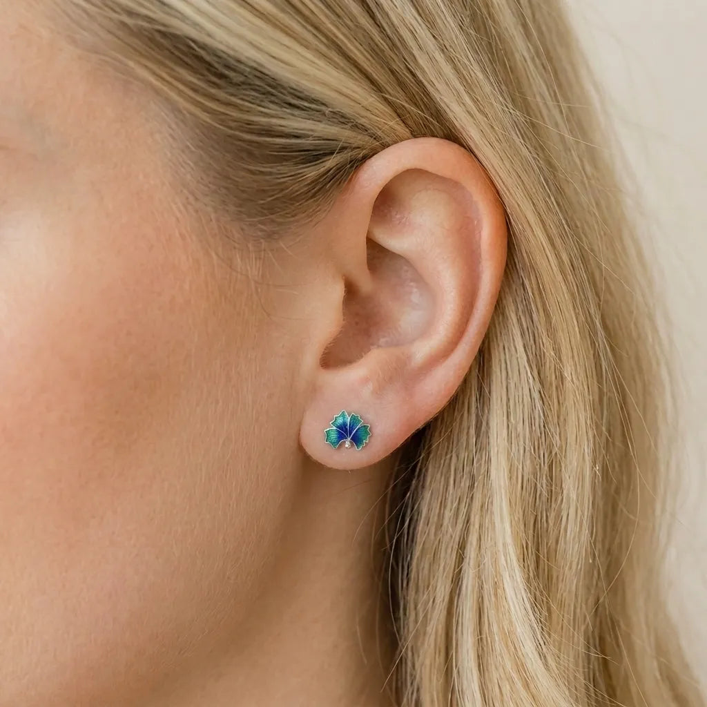 Marvel Silver blue and green enamel leaf stud earrings for women and girls featuring a silver-plated finish with a nature-inspired minimalist design.