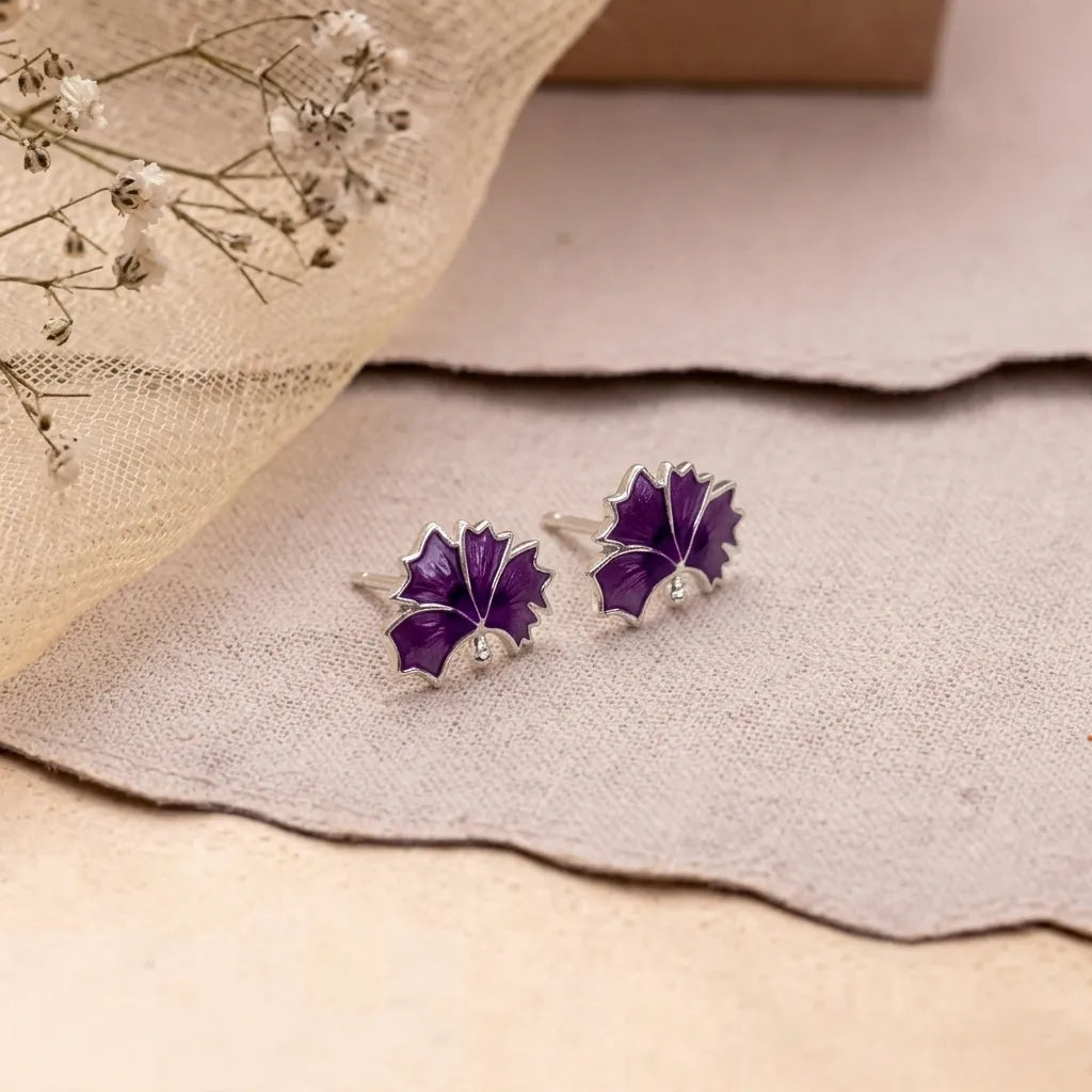 Marvel Silver blue and green enamel leaf stud earrings for women and girls featuring a silver-plated finish with a nature-inspired minimalist design.